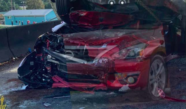 Driver Survives Car Folding Onto Itself In Crash With A Semi