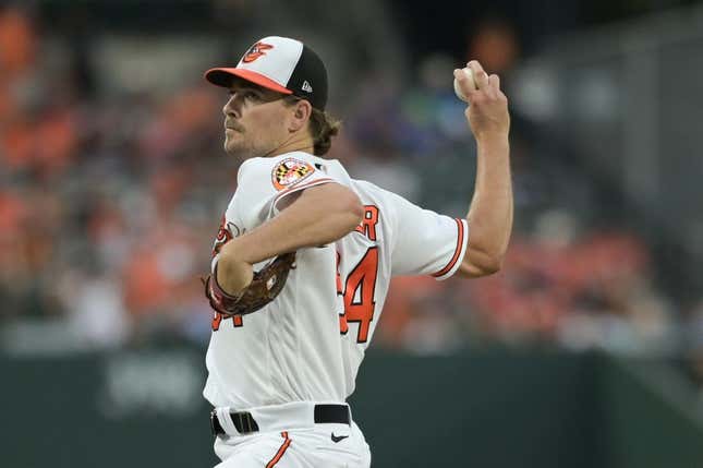 Aug 23, 2023; Baltimore, Maryland, USA;  Baltimore Orioles starting pitcher Dean Kremer (64) delivers a first inning pitch against the Toronto Blue Jays at Oriole Park at Camden Yards.