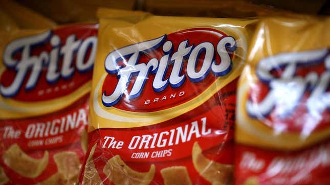 Bags of Fritos on grocery shelf