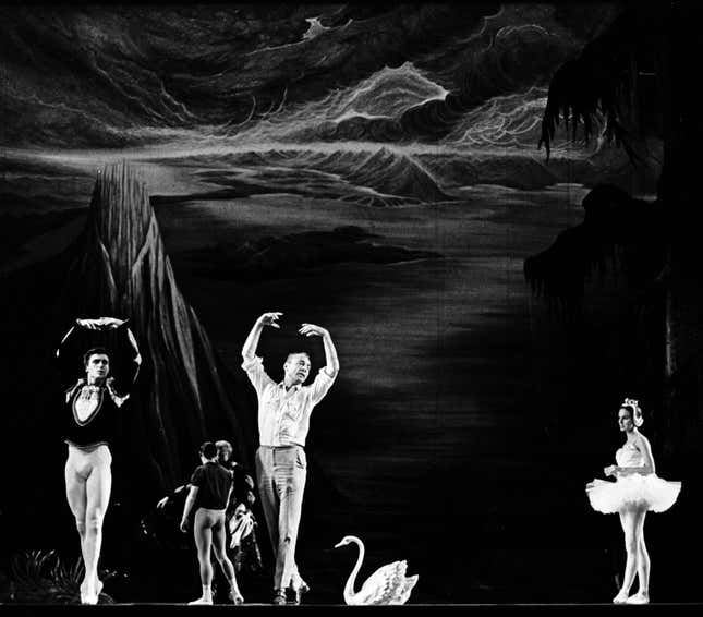 George Balanchine rehearsing Edward Villella and Patricia McBride in Swan Lake, Act II in 1964.