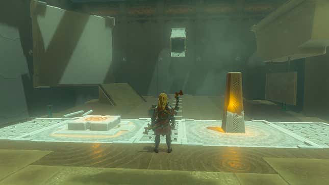 Link stands in between a big button and a big pillar.