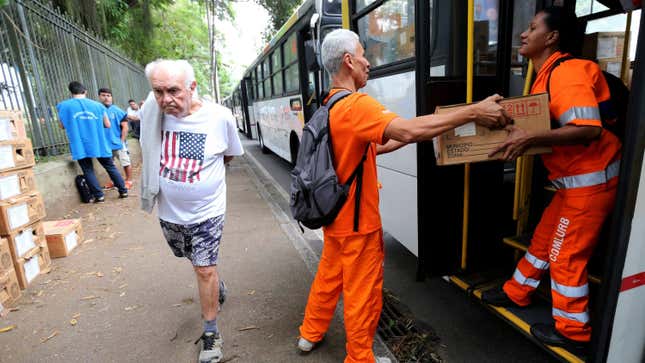 Buses are used to transport voting machines in Rio.