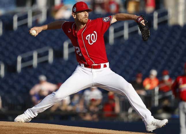 Mar 24, 2023; West Palm Beach, Florida, USA; Washington Nationals starting pitcher Chad Kuhl (52) pitches against the St. Louis Cardinals during the first inning at The Ballpark of the Palm Beaches.