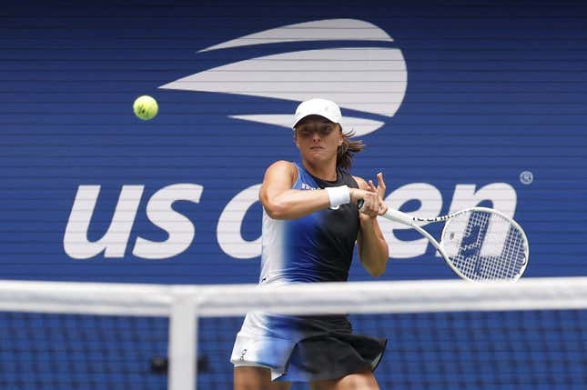 Aug 28, 2023; Flushing, NY, USA; Iga Swiatek of Poland hits a forehand against Rebecca Peterson of Sweden (not pictured) on day one of the 2023 US Open at the Billie Jean King National Tennis Center.