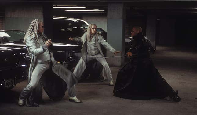 the twins battle morpheus in a parking garage