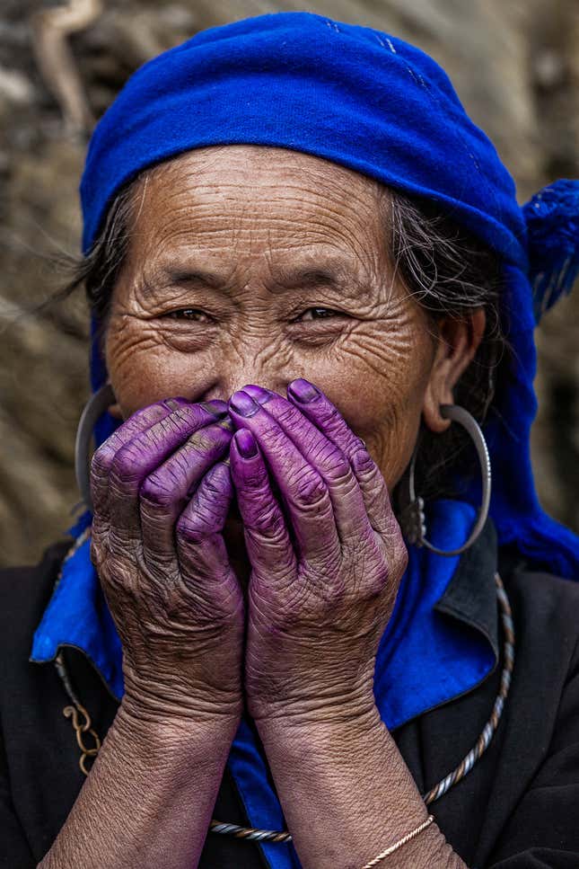 Hmong woman with indigo dye.