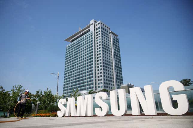 A tall building with the SAMSUNG logo in front of it.