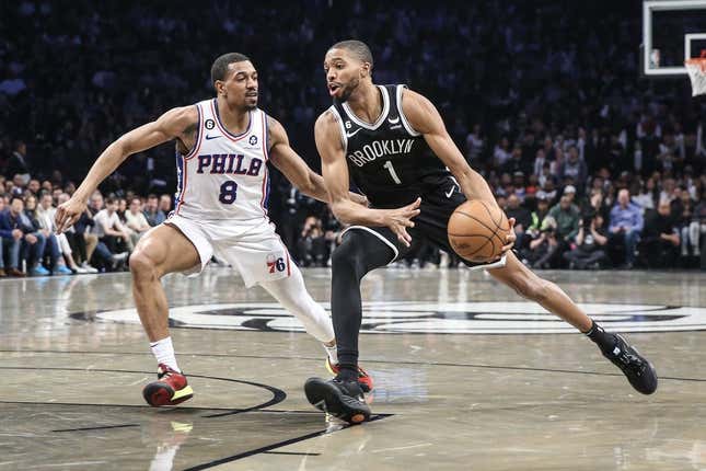 Apr 20, 2023; Brooklyn, New York, USA; Brooklyn Nets forward Mikal Bridges (1) looks to drive past Philadelphia 76ers guard De&#39;Anthony Melton (8) during game three of the 2023 NBA playoffs at Barclays Center.