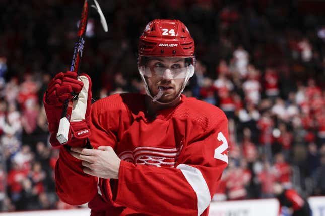 Mar 23, 2023; Detroit, Michigan, USA; Detroit Red Wings center Pius Suter (24) adjusts his glove during the second period against the St. Louis Blues at Little Caesars Arena.