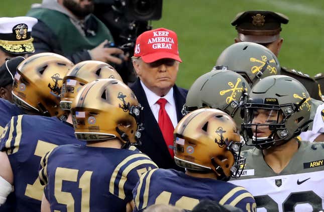 U.S. President Donald Trump participates in the coin toss before the game between the Army Black Knights and the Navy Midshipmen at Lincoln Financial Field on December 14, 2019, in Philadelphia, Penn.