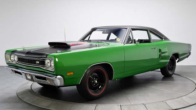 A photo of a green Dodge Super Bee. 