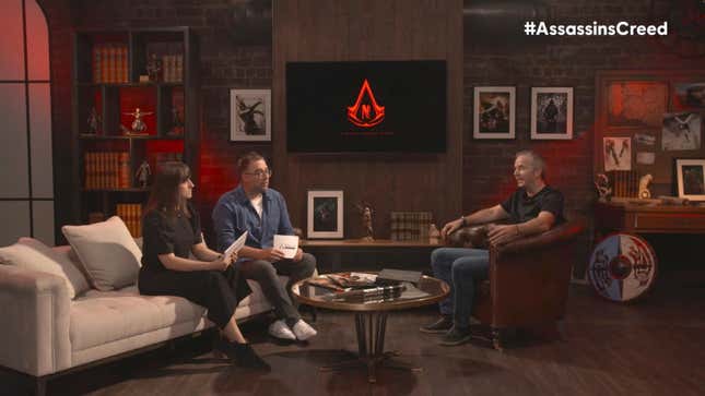 A screenshot of the Assassin's Creed showcase shows the hosts talking while an Assassin's Creed-themed Netflix logo is on a screen.