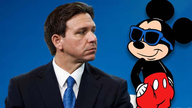 Ron DeSantis looks at a cool Mickey in sunglasses. 