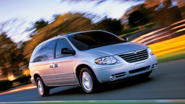A silver Cadillac minivan 