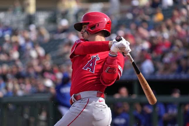 Mar 5, 2023; Surprise, Arizona, USA; Los Angeles Angels infielder Zach Neto (94) bats against the Texas Rangers during the fourth inning at Surprise Stadium.