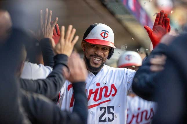 Apr 27, 2023; Minneapolis, Minnesota, USA; Minnesota Twins designated hitter Byron Buxton (25) celebrates with teammates after hitting a three run home run in the fourth inning against the Kansas City Royals at Target Field.