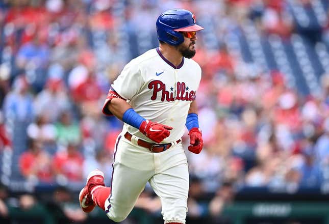 Sep 10, 2023; Philadelphia, Pennsylvania, USA; Philadelphia Phillies outfielder Kyle Schwarber (12) advances to first after hitting a single against the Miami Marlins in the first inning at Citizens Bank Park.