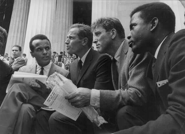 Harry Belafonte, left; Charlton Heston, Burt Lancaster and Sidney Poitier attending the March on Washington for Jobs and Freedom in Washington D C, August 28th 1963.