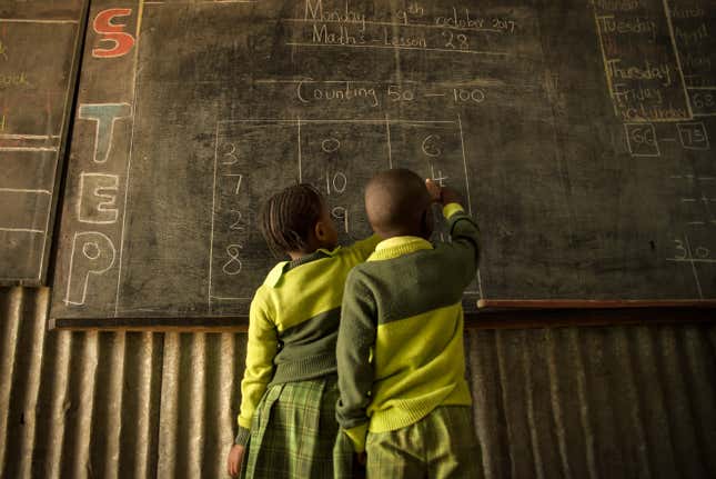 Bridge Academy students practice mathematics at the Kingston school in Nairobi, Kenya.