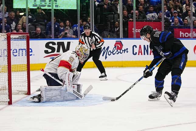 Mar 29, 2023; Toronto, Ontario, CAN; Toronto Maple Leafs forward Mitchell Marner (16) skates in on a breakaway against Florida Panthers goaltender Alex Lyon (34) during the third period at Scotiabank Arena.