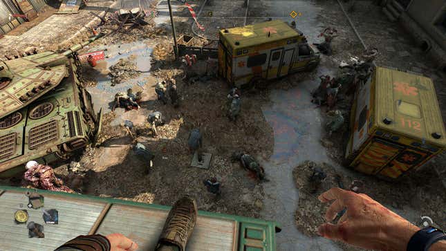 A group of zombies below a player who is standing above on a light post.