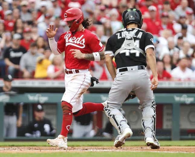 May 6, 2023; Cincinnati, Ohio, USA; Cincinnati Reds second baseman Jonathan India (6) scores against Chicago White Sox catcher Seby Zavala (44) during the first inning at Great American Ball Park.