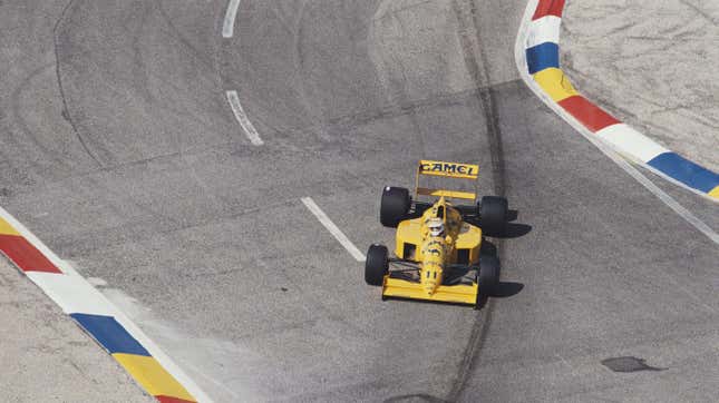 Nelson Piquet of Brazil drives the No. 11 Camel Team Lotus Lotus 101 Judd V8 during the 1989 French Grand Prix.