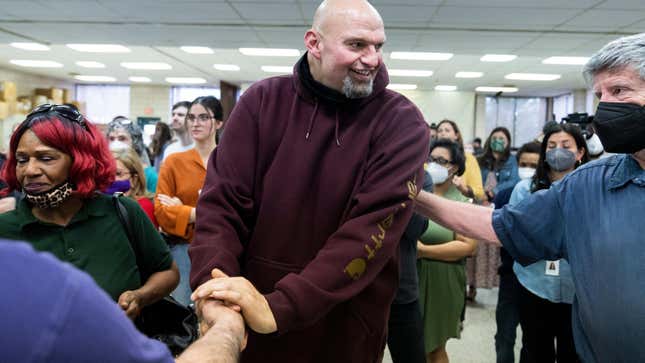Democratic candidate for U.S. Senate Lt. Gov. John Fetterman, speaks with guests during a rally at the UFCW Local 1776 KS headquarters in Plymouth Meeting, Pa., on Saturday, April 16, 2022.