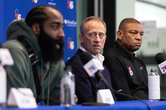 Feb 15, 2022; Camden, NJ, USA; Philadelphia 76ers owner Josh Harris looks on as James Harden speaks with the media during a press conference at Philadelphia 76ers Training Complex.