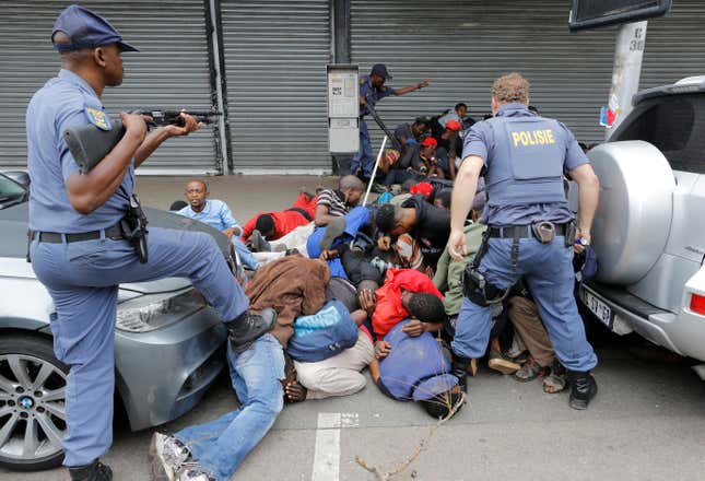 Photos: An anti-immigration march in South Africa sparks violence