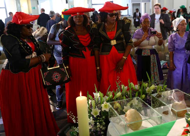 Namibian delegation attend a ceremony in Berlin, Germany, Aug. 29, 2018, to hand back human remains from Germany to Namibia following the 1904-1908 genocide against the Herero and Nama