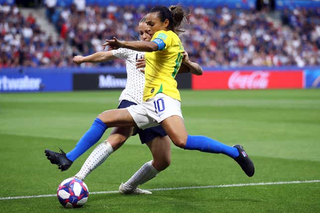Marta of Brazil is challenged by Marion Torrent of France during the 2019 FIFA Women's World Cup France