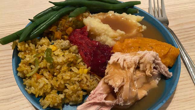 Thanksgiving foods arranged on a plate 