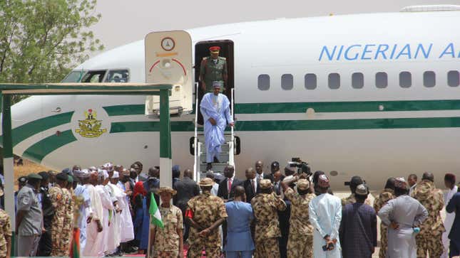 The President of Nigeria disembarking from the country's Boeing Business Jet