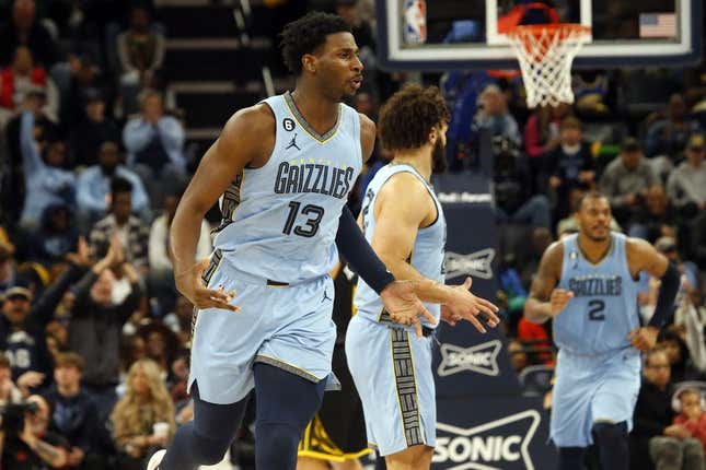 Mar 18, 2023; Memphis, Tennessee, USA; Memphis Grizzlies forward Jaren Jackson Jr. (13) reacts after a basket during the second half against the Golden State Warriors at FedExForum.