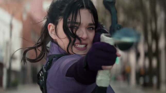 Hailee Steinfield as Kate Bishop pulls back hard on her bow to release a trick arrow in Hawkeye.