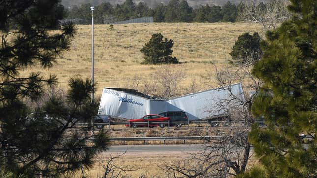 High winds toppled a semi-truck on I-25.