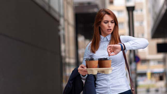Image for article titled Study: Greatest Indicator Of Stress Blowing Hair Off Face While Carrying Complicated Coffee Order For Boss Across Bustling City Streets