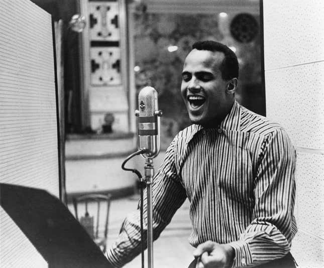 Harry Belafonte performing in a recording studio, circa 1957.