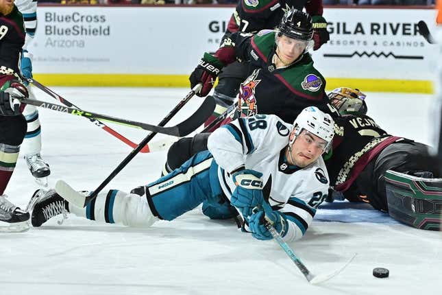 Jan 10, 2023; Tempe, Arizona, USA;  San Jose Sharks right wing Timo Meier (28) plays the puck while on the ice as Arizona Coyotes defenseman Juuso Valimaki (4) defends in the third period at Mullett Arena.