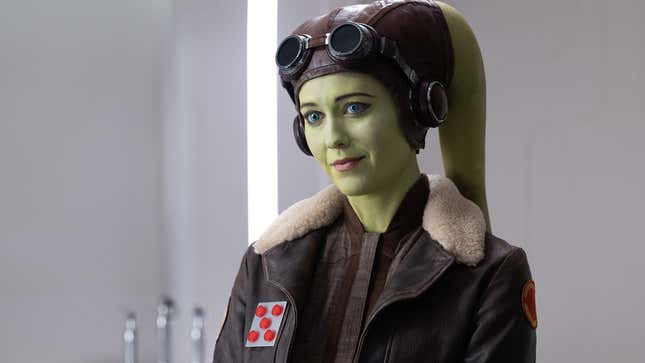 Mary Elizabeth Winstead as Hera Syndulla, standing in a bomber jacket and goggles.