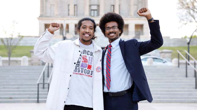 NASHVILLE, TENNESSEE - APRIL 18: Tennessee State Representatives Justin Jones and Justin J. Pearson are seen during a demonstration of linking arms in support of gun control laws sponsored by Voices for a Safer Tennessee at Legislative Plaza on April 18, 2023 in Nashville, Tennessee. The event is in response to the mass shooting on March 27 at The Covenant School in Nashville where three 9-year-old students and three adults were killed by a 28-year-old former student. (Photo by Jason Kempin/Getty Images)