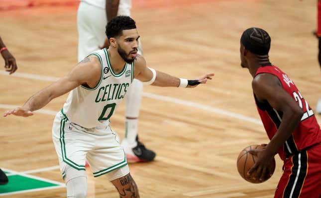 May 17, 2023; Boston, Massachusetts, USA; Boston Celtics forward Jayson Tatum (0) guards Miami Heat forward Jimmy Butler (22) during the second half in game one of the Eastern Conference Finals for the 2023 NBA playoffs at TD Garden.