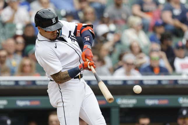 May 13, 2023; Detroit, Michigan, USA;  Detroit Tigers shortstop Javier Baez (28) hits a single in the seventh inning against the Seattle Mariners at Comerica Park.