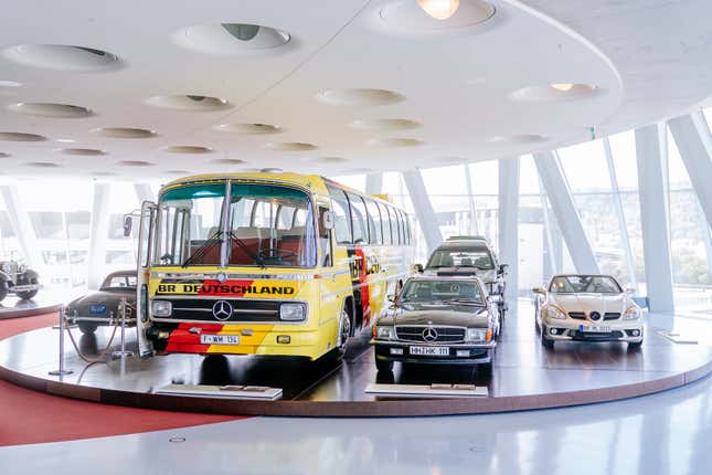 The O 302 bus on display among other historic Mercedes-Benz models