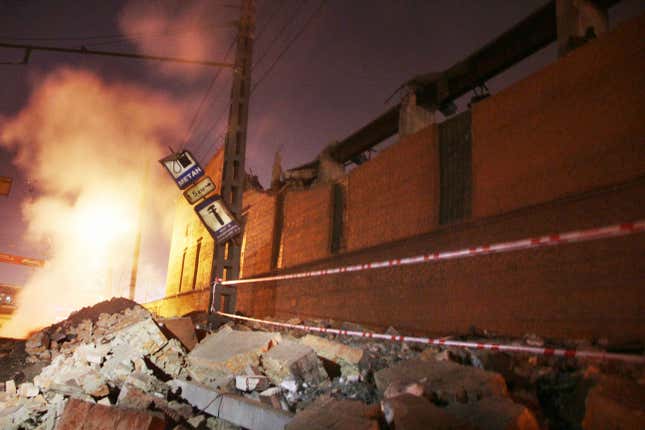 Damage to a local factory following the explosion of the Chelyabinsk meteor and meteorites that impacted the area.
