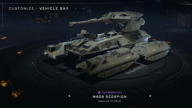 A Halo Infinite player looks at a scorpion in Halo Infinite's vehicle bay on Xbox Series X.