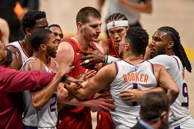 Devin Booker and Nikola Jokić jaw it up after the MVP’s hard foul and subsequent ejection last night.