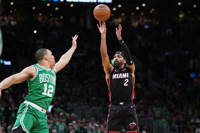 May 29, 2023; Boston, Massachusetts, USA; Miami Heat guard Gabe Vincent (2) shoots a three pointer against Boston Celtics forward Grant Williams (12) in the second quarter during game seven of the Eastern Conference Finals for the 2023 NBA playoffs at TD Garden.