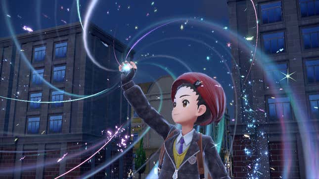 A Pokémon trainer is seen charging up his Tera Orb and raising it above his head.